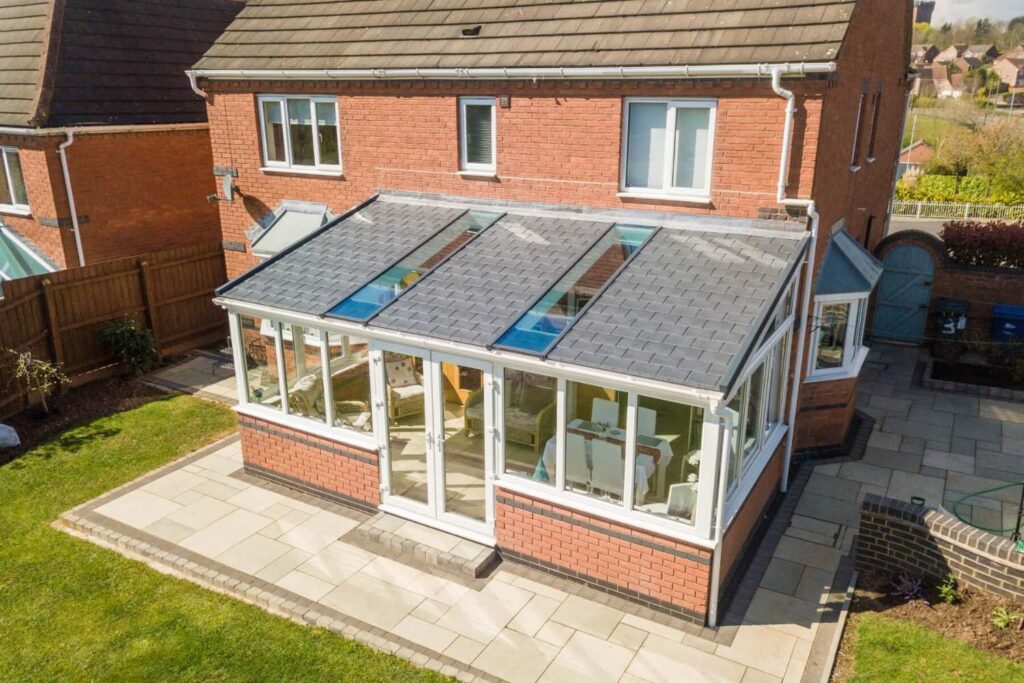 Lean-To Conservatory With Solid Roof