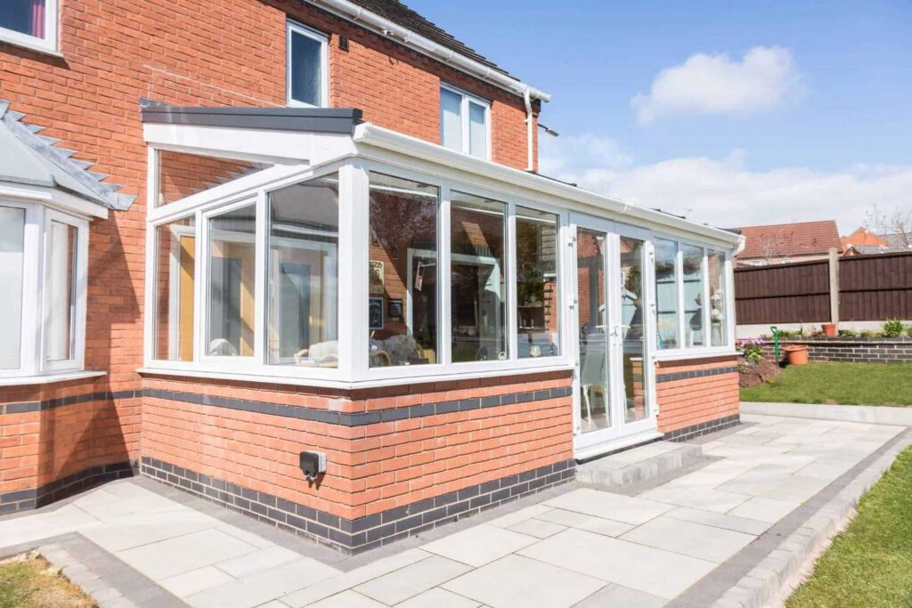 Lean-To Conservatory With Solid Roof