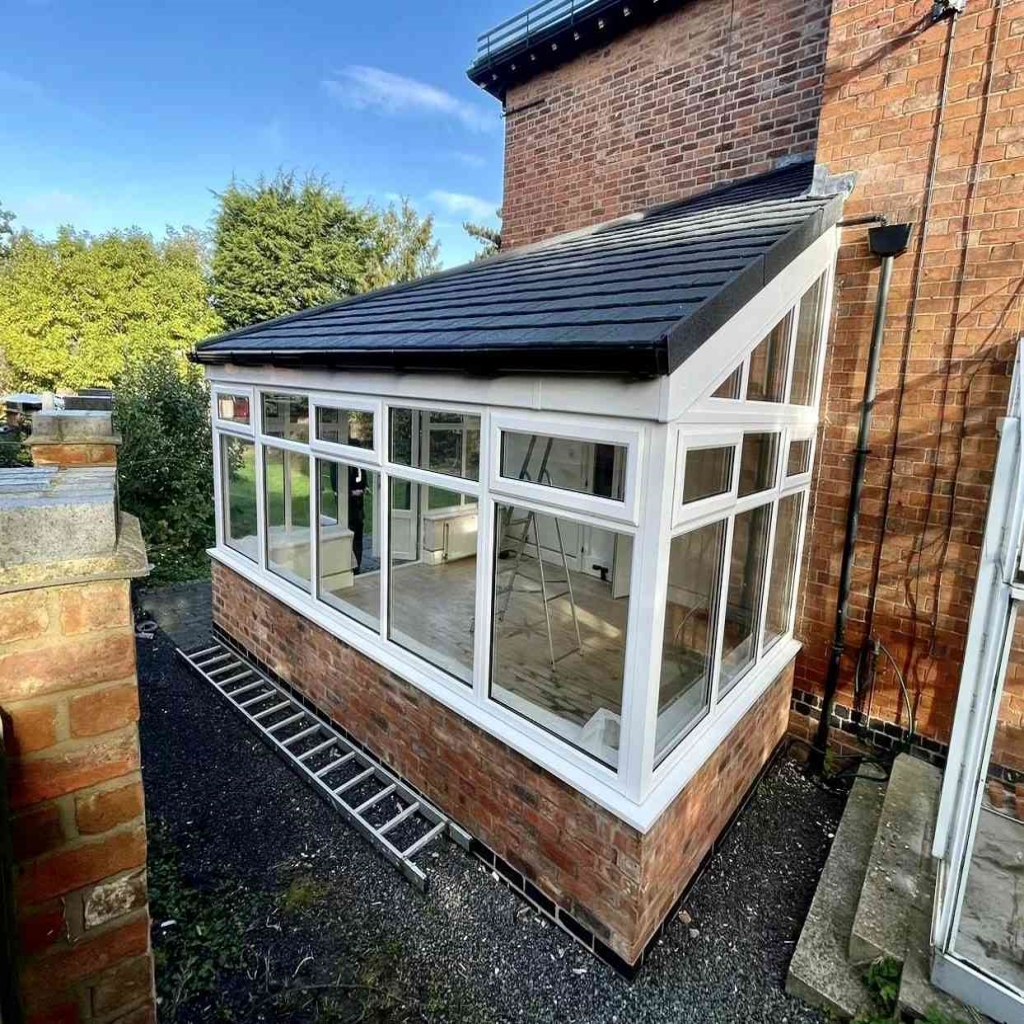 Lean-To Conservatory With Solid Roof